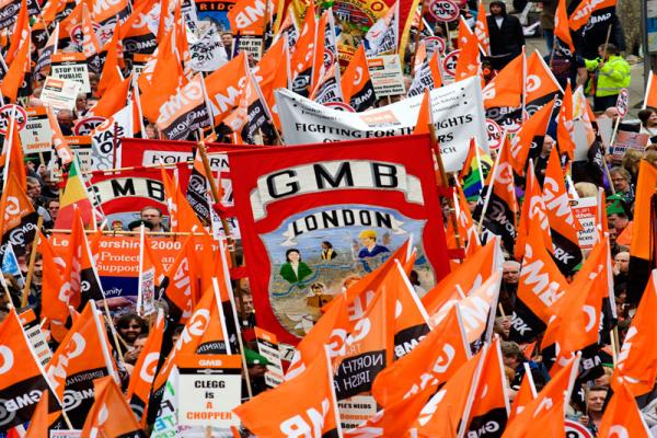 GMB London protest on Wednesday 23 March outside Decathlon Wandsworth over plans to cash in on Russian invasion of Ukraine